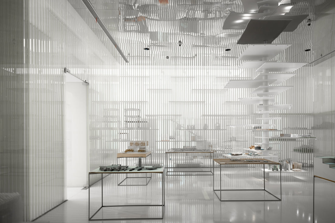a room filled with lots of white furniture